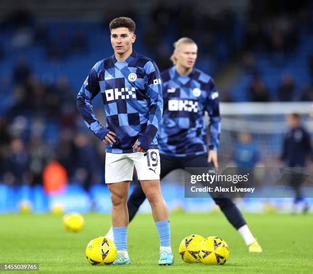 Julian Alvarez of Manchester City warms up prior to the Emirates FA Cup Third Round match between Manchester City and Chelsea at Etihad Stadium on...