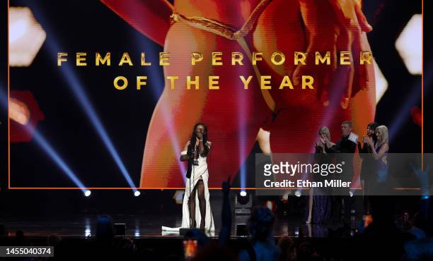 Adult film actress Kira Noir accepts the Female Performer of the Year award during the 2023 Adult Video News Awards at Resorts World Las Vegas on...