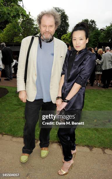 Mike Figgis and Rosey Chan attend a private viewing of the 2012 Serpentine Gallery Pavilion designed by Herzog & de Meuron and Ai Weiwei at The...