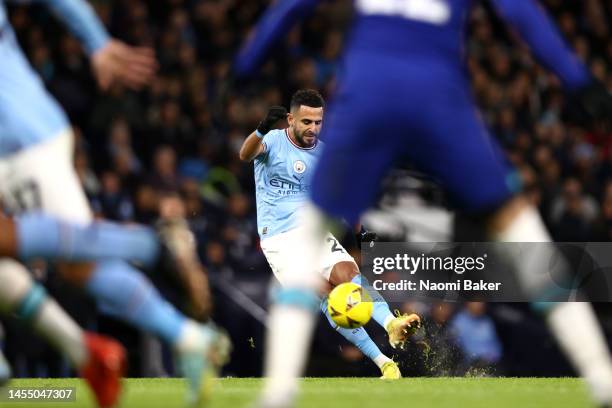 Riyad Mahrez of Manchester City scores the team's first goal during the Emirates FA Cup Third Round match between Manchester City and Chelsea at...