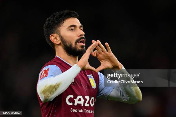 Morgan Sanson of Aston Villa celebrates after scoring the team's first goal during the Emirates FA Cup Third Round match between Aston Villa and...