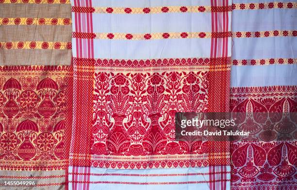 traditional gamosa displayed for sell - bihu stock pictures, royalty-free photos & images