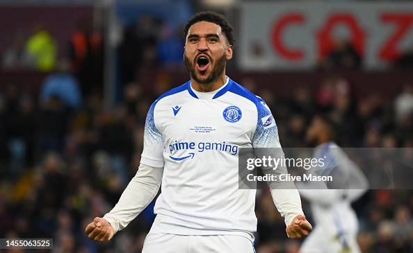 Jamie Reid of Stevenage celebrates after scoring the team's first ...
