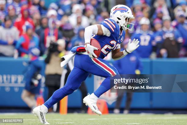 Nyheim Hines of the Buffalo Bills returns the opening kickoff for a touchdown during the first quarter against the New England Patriots at Highmark...