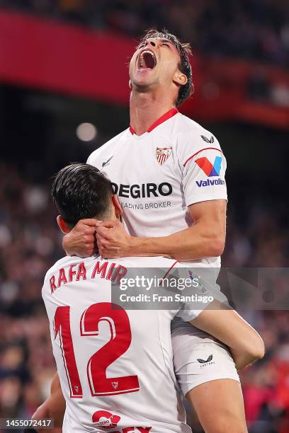 Rafa Mir of Sevilla FC celebrates with Oliver Torres after scoring the team's second goal during the LaLiga Santander match between Sevilla FC and...