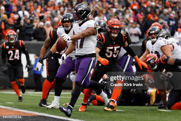 Kenyan Drake of the Baltimore Ravens scores a touchdown during the second quarter against the Cincinnati Bengals at Paycor Stadium on January 08,...