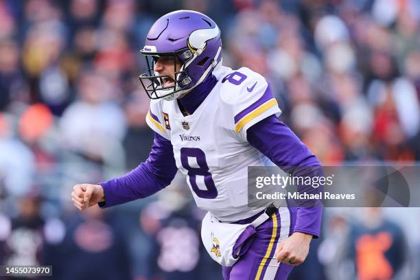 Kirk Cousins of the Minnesota Vikings celebrates after a touchdown in the second quarter of a game against the Chicago Bears at Soldier Field on...