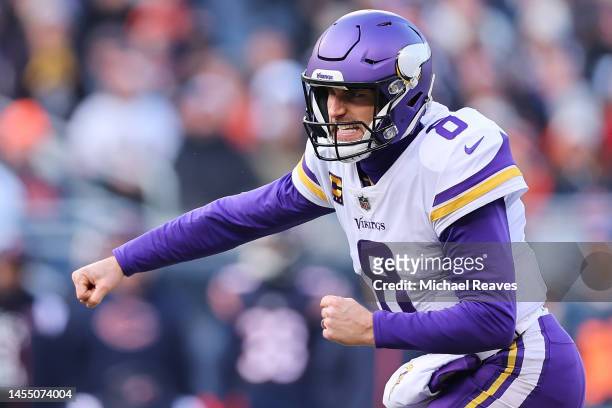 Kirk Cousins of the Minnesota Vikings celebrates after a touchdown in the second quarter of a game against the Chicago Bears at Soldier Field on...