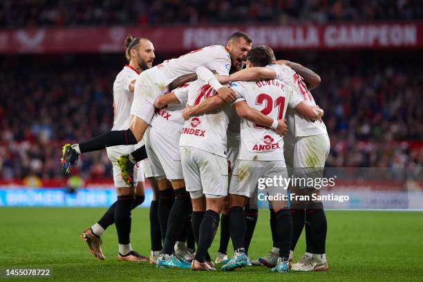 Marcos Acuna of Sevilla FC celebrates scoring their teams first goal with team mates during the LaLiga Santander match between Sevilla FC and Getafe...