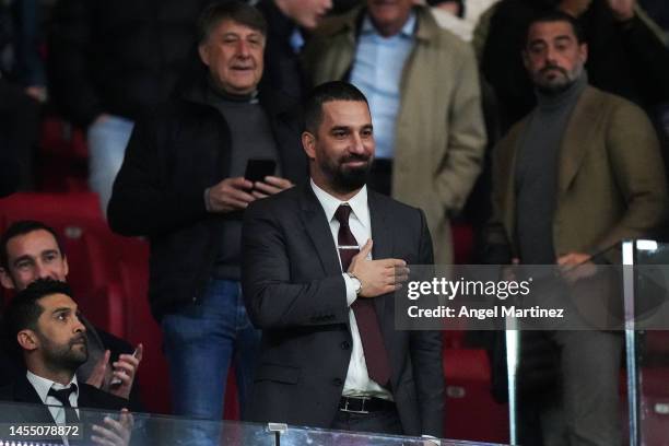 Former Atletico Madrid player, Arda Turan acknowledges the fans prior to the LaLiga Santander match between Atletico de Madrid and FC Barcelona at...