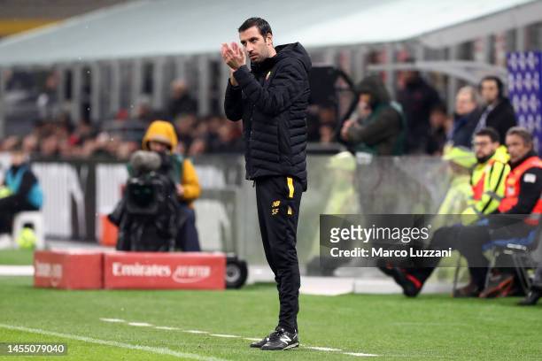 Salvatore Foti, Assistant manager at AS Roma applauds during the Serie A match between AC Milan and AS Roma at Stadio Giuseppe Meazza on January 08,...