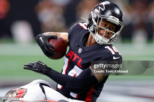 Damiere Byrd of the Atlanta Falcons is tackled by Dee Delaney of the Tampa Bay Buccaneers during the second quarter at Mercedes-Benz Stadium on...