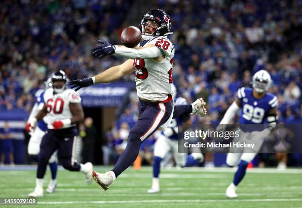 Running back Rex Burkhead of the Houston Texans cannot hang onto the ball for an incomplete pass during the game against the Indianapolis Colts at...