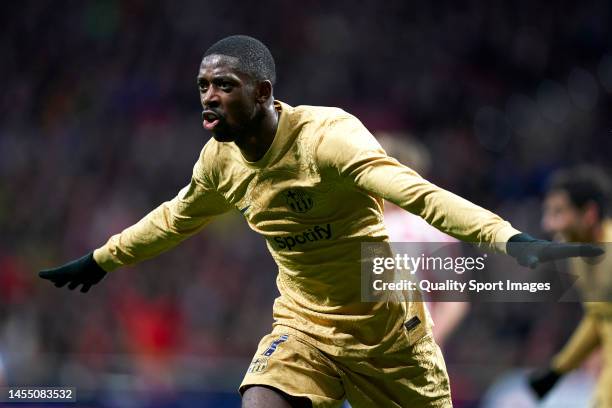Ousmane Dembele of FC Barcelona celebrates after scoring his team's first goal during the LaLiga Santander match between Atletico de Madrid and FC...
