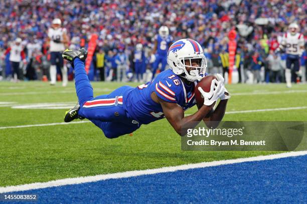 John Brown of the Buffalo Bills catches a touchdown pass during the third quarter against the New England Patriots at Highmark Stadium on January 08,...