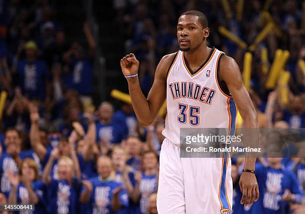 Kevin Durant of the Oklahoma City Thunder reacts in the third quarter while taking on the San Antonio Spurs in Game Three of the Western Conference...