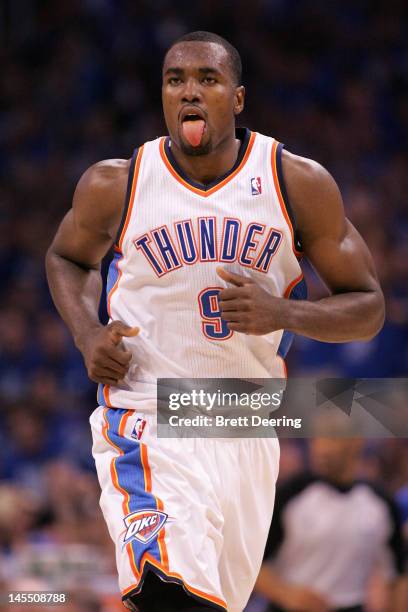 Serge Ibaka of the Oklahoma City Thunder reacts in the fourth quarter while taking on the San Antonio Spurs in Game Three of the Western Conference...