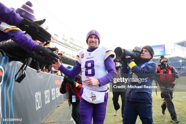 Kirk Cousins of the Minnesota Vikings walks off the field after the game against the Chicago Bears at Soldier Field on January 08, 2023 in Chicago,...