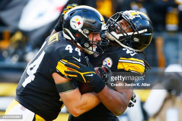 Derek Watt of the Pittsburgh Steelers celebrates a touchdown with Najee Harris of the Pittsburgh Steelers during the fourth quarter of the game...