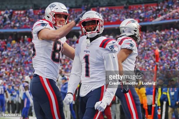 Hunter Henry of the New England Patriots celebrates with DeVante Parker of the New England Patriots after Parker's touchdown reception during the...