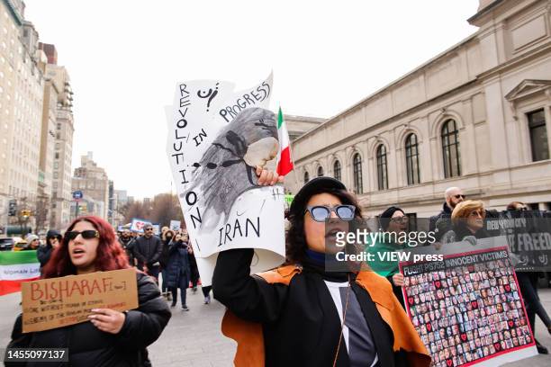 People take part in a march on January 8, 2023 in New York. People from Woman Life Freedom NYC and local Iranian activists march and protest, joining...