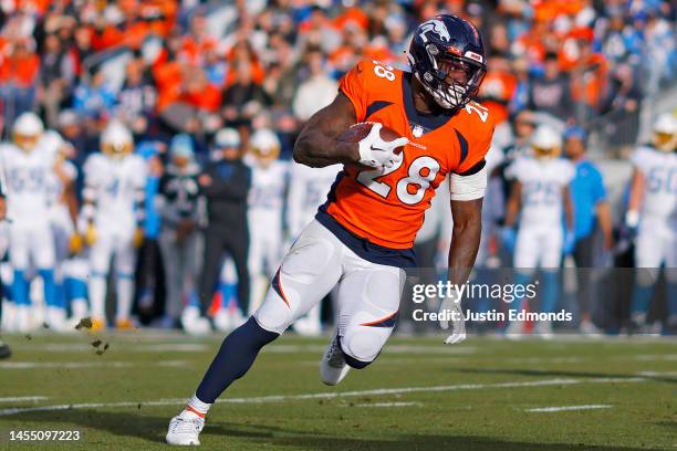 Latavius Murray of the Denver Broncos runs for a touchdown during the first quarter against the Los Angeles Chargers at Empower Field At Mile High on...