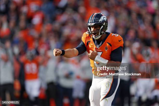 Russell Wilson of the Denver Broncos celebrates after his team's touchdown during the first quarter against the Los Angeles Chargers at Empower Field...