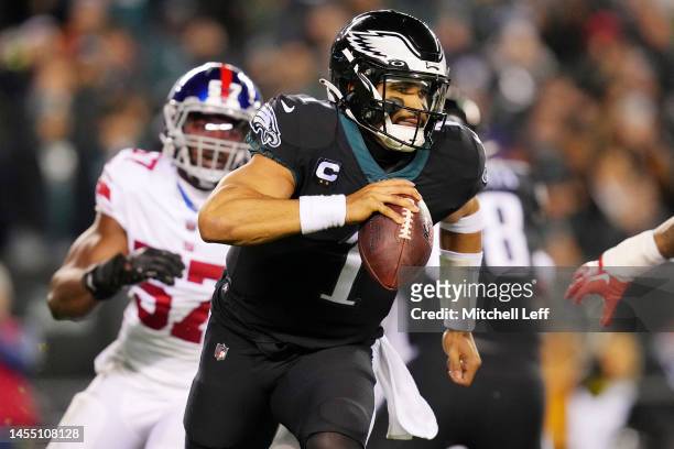 Jalen Hurts of the Philadelphia Eagles scrambles during the second quarter against the New York Giants at Lincoln Financial Field on January 08, 2023...