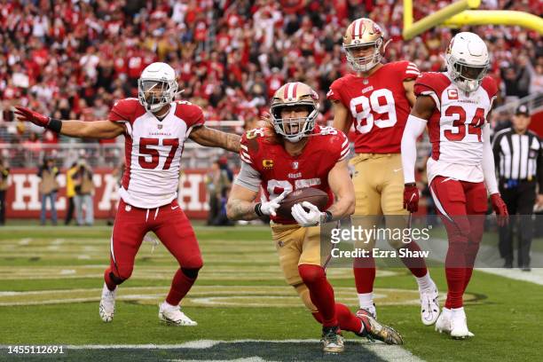 George Kittle of the San Francisco 49ers celebrates after scoring a touchdown during the third quarter against the Arizona Cardinals at Levi's...