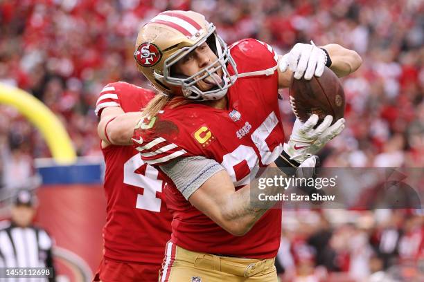 George Kittle of the San Francisco 49ers celebrates after scoring a touchdown during the third quarter against the Arizona Cardinals at Levi's...