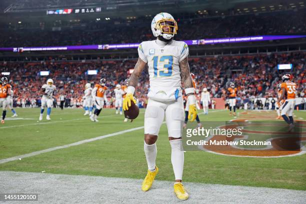 Keenan Allen of the Los Angeles Chargers reacts after a touchdown reception during the fourth quarter against the Denver Broncos at Empower Field At...