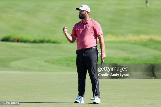Jon Rahm of Spain celebrates after making his putt for birdie on the 18th green during the final round of the Sentry Tournament of Champions at...