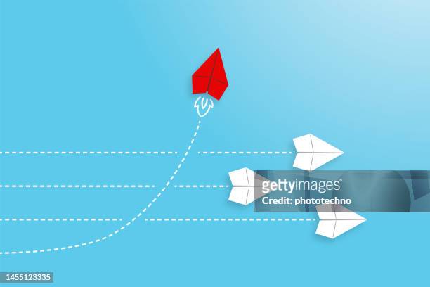 change concepts with red paper airplane leading among white - business stock illustrations