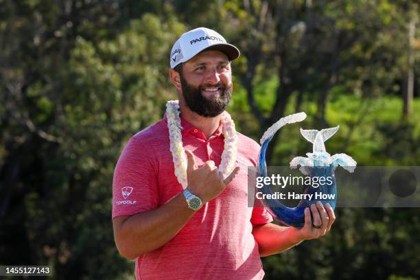 Jon Rahm of Spain celebrates with the trophy after winning during the final round of the Sentry Tournament of Champions at Plantation Course at...