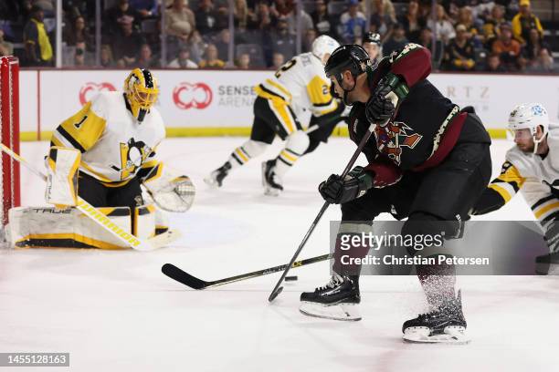 Zack Kassian of the Arizona Coyotes attempts a shot on goaltender Casey DeSmith of the Pittsburgh Penguins during the second period of the NHL game...