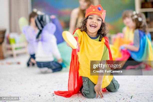 playing dress-up - kids dressing up stock pictures, royalty-free photos & images