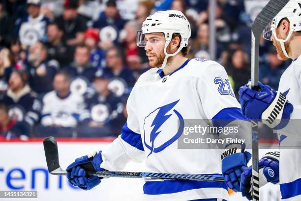 Brayden Point of the Tampa Bay Lightning looks on during a third period stoppage in play against the Winnipeg Jets at the Canada Life Centre on...