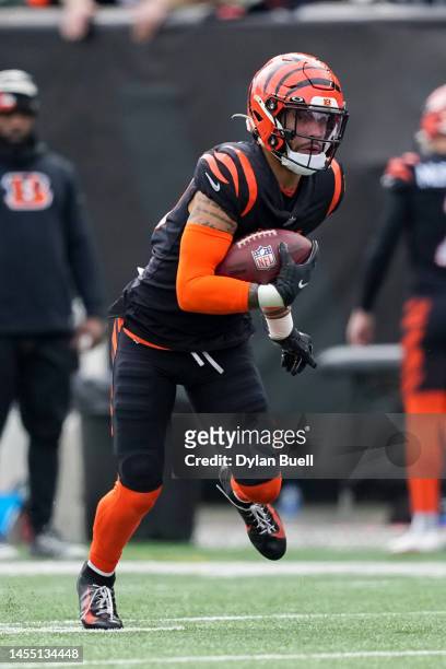 Tyler Boyd of the Cincinnati Bengals runs with the ball in the first quarter against the Baltimore Ravens at Paycor Stadium on January 08, 2023 in...