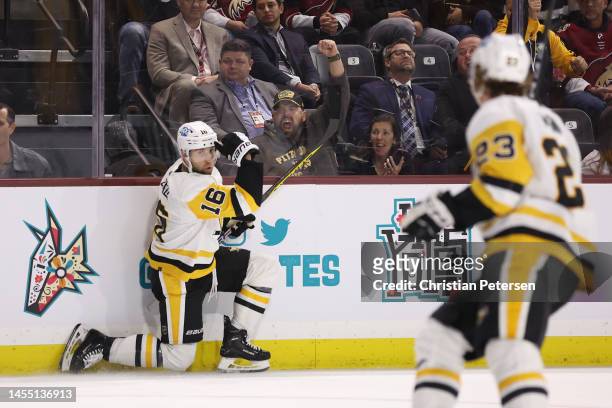 Jason Zucker of the Pittsburgh Penguins celebrates after scoring a goal against the Arizona Coyotes during the third period of the NHL game at...