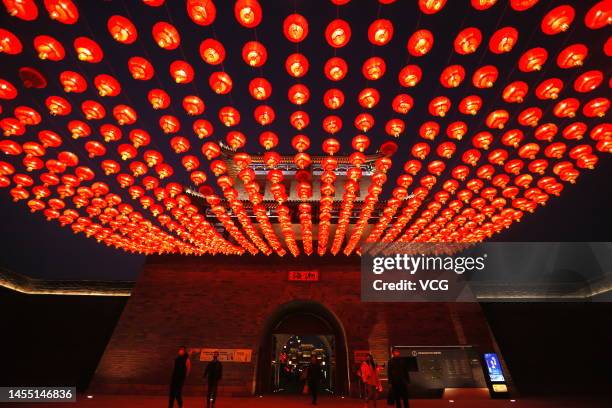 Clusters of red lanterns are hung up at an ancient building to light up the ancient city of Jimo, which was built in the Spring and Autumn Period, to...