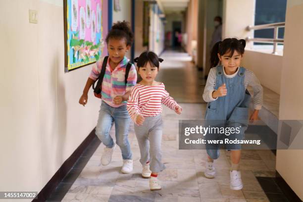 Kid Rushing To Classa Kids Running Out Of Classroom Photos and Premium High Res Pictures ...