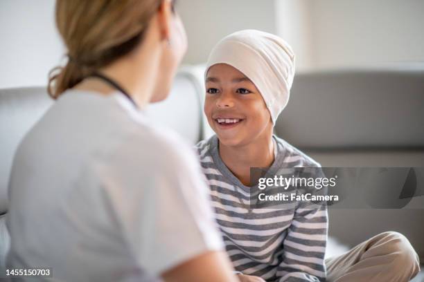 cancer patient at home - childhood cancer stock pictures, royalty-free photos & images