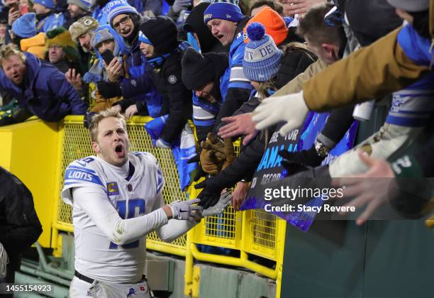 Jared Goff of the Detroit Lions greets fans after defeating the Green Bay Packers at Lambeau Field on January 08, 2023 in Green Bay, Wisconsin.