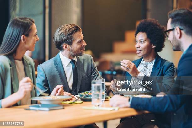 business people in a restaurant - victory dinner stockfoto's en -beelden