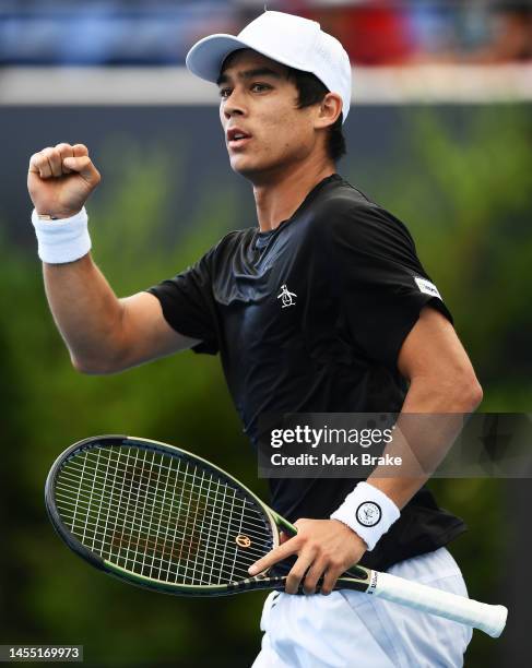 Mackenzie McDonald of USA celebrates winning a game against Daniel Evans of Great Britain during day one of the 2023 Adelaide International at...