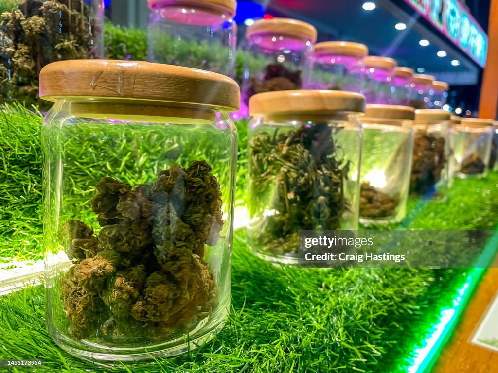 Cannabis in glass Jars for sale on the streets of Bangkoks night markets and tourist areas. The Thai Government are relaxing laws on the intoxicating drug substance. Bangkok Thailand