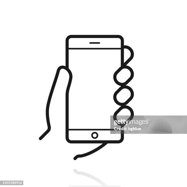 hands holding mobile phone. icon with reflection on white background - using tablet blank screen stock illustrations