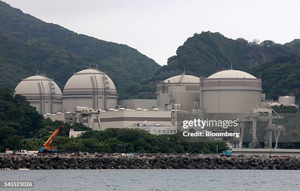 The No. 4, from left, No. 3, No. 2 and No. 1 reactor buildings stand at Kansai Electric Power Co.'s Ohi nuclear power station in Ohi Town, Fukui...