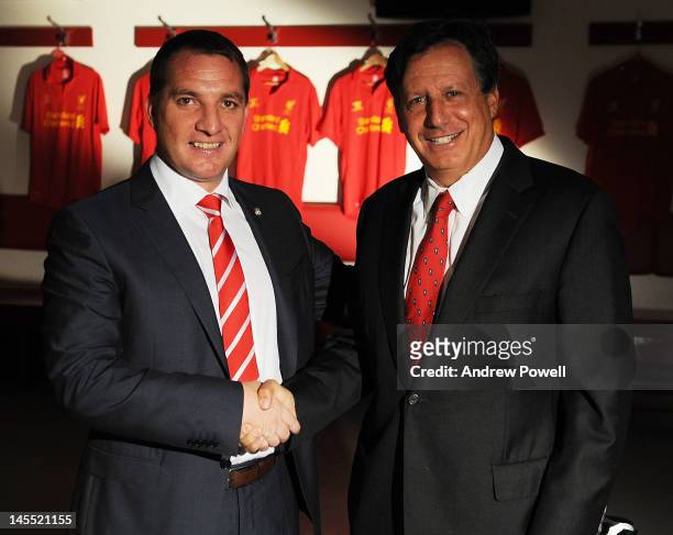Brendan Rodgers poses for pictures with Liverpool FC owner Tom Werner as he is officially unveiled as new manager of Liverpool FC at Anfield on June...