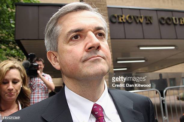Former Cabinet Minister Chris Huhne leaves Southwark Crown Court after a pre-trial hearing on June 1, 2012 in London, England. Mr Huhne and his...